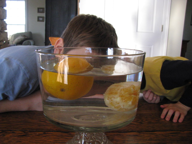 Use oranges and water to demonstrate the importance of girding ourselves with the Armor of God