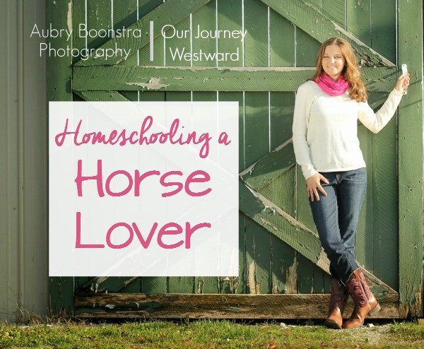 Girl in white sweater and pink scarf poses next to a green door. For a blog image about homeschooling a horse lover.